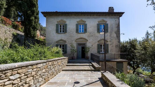 Splendid, meticulously restored 12th century villa and land in the heart of Cortona, Tuscany.