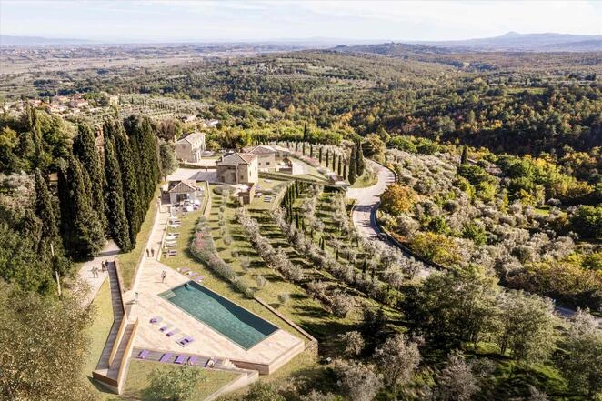 Partially restored historic villa complex dominating the hills of Southern Tuscany.