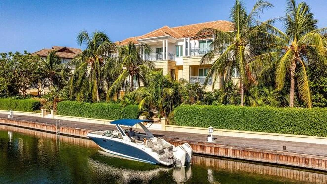 Charming house within one of Cayman's most coveted waterfront communities